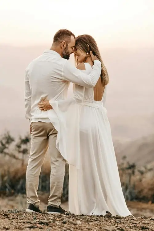 Married couple hugging